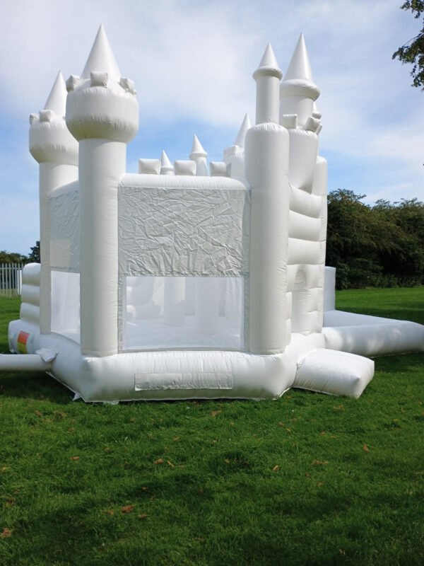 white bouncy castle with slide for hire