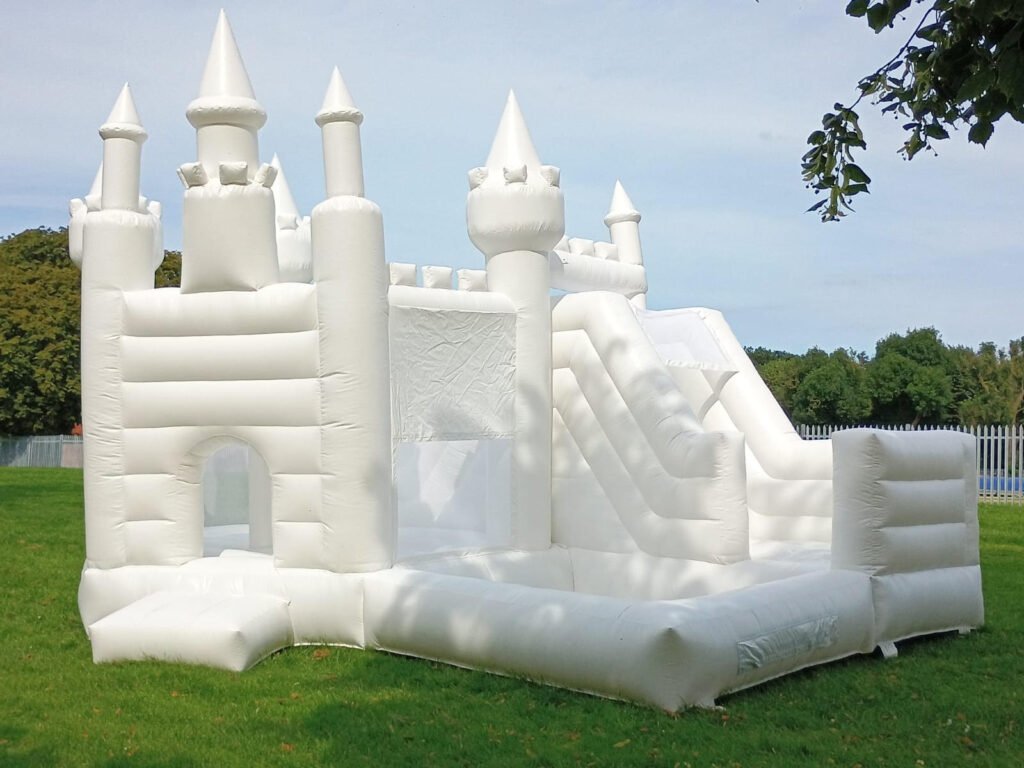 white bouncy castle with slide to hire