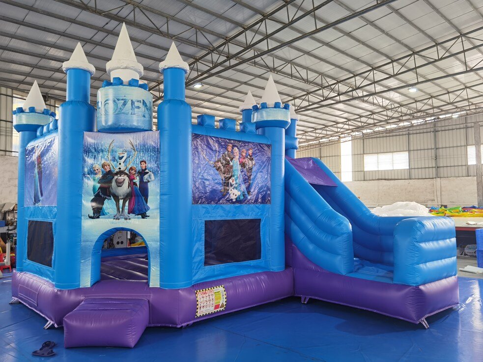 frozen themed bouncy castle and slide to hire