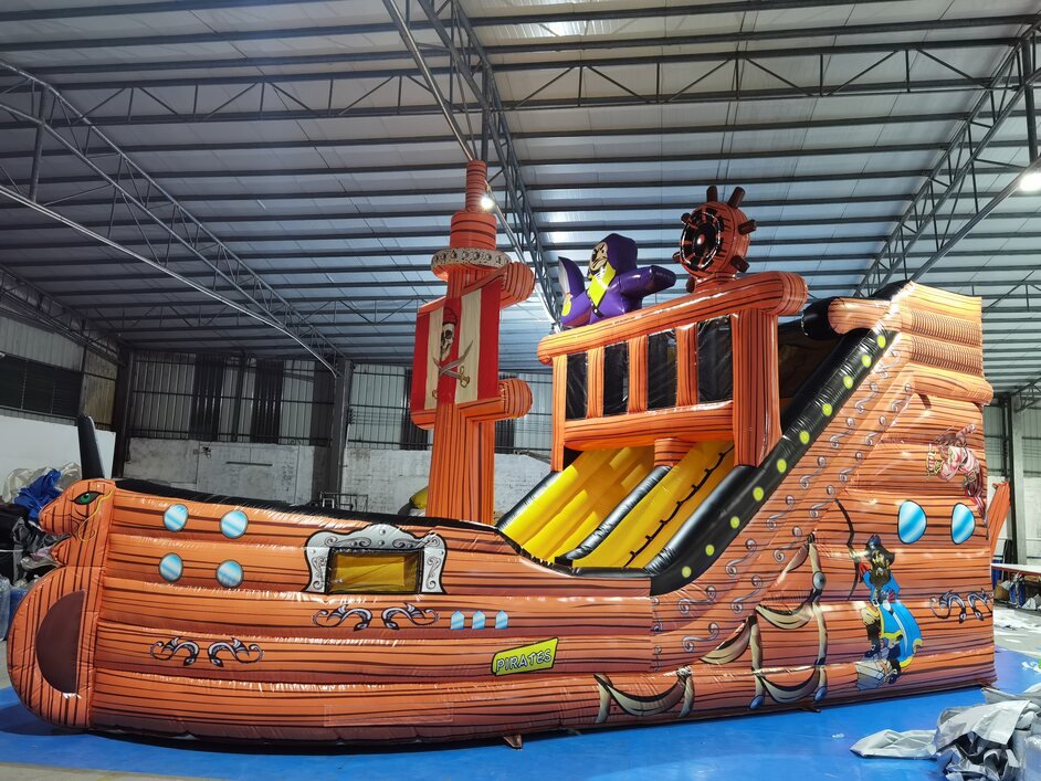 pirate ship bouncy castle with slide to hire