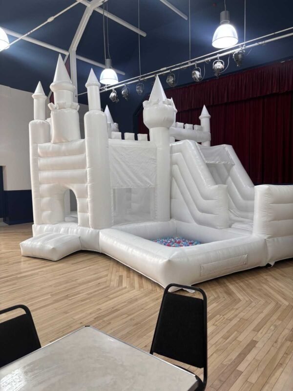 white bouncy castle with ball pit to hire