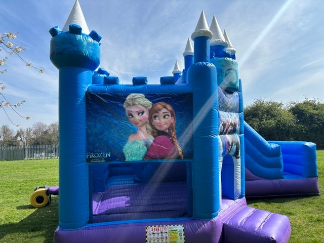 Frozen Bouncy castle with slide to hire