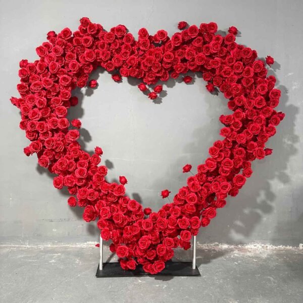 Red heart flower wall to hire
