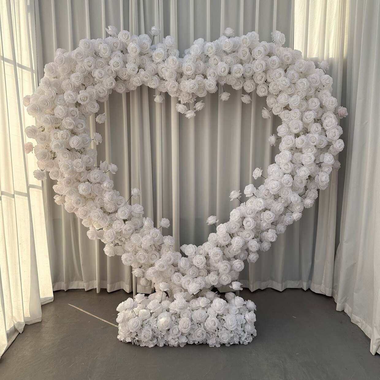 White heart flower wall to hire