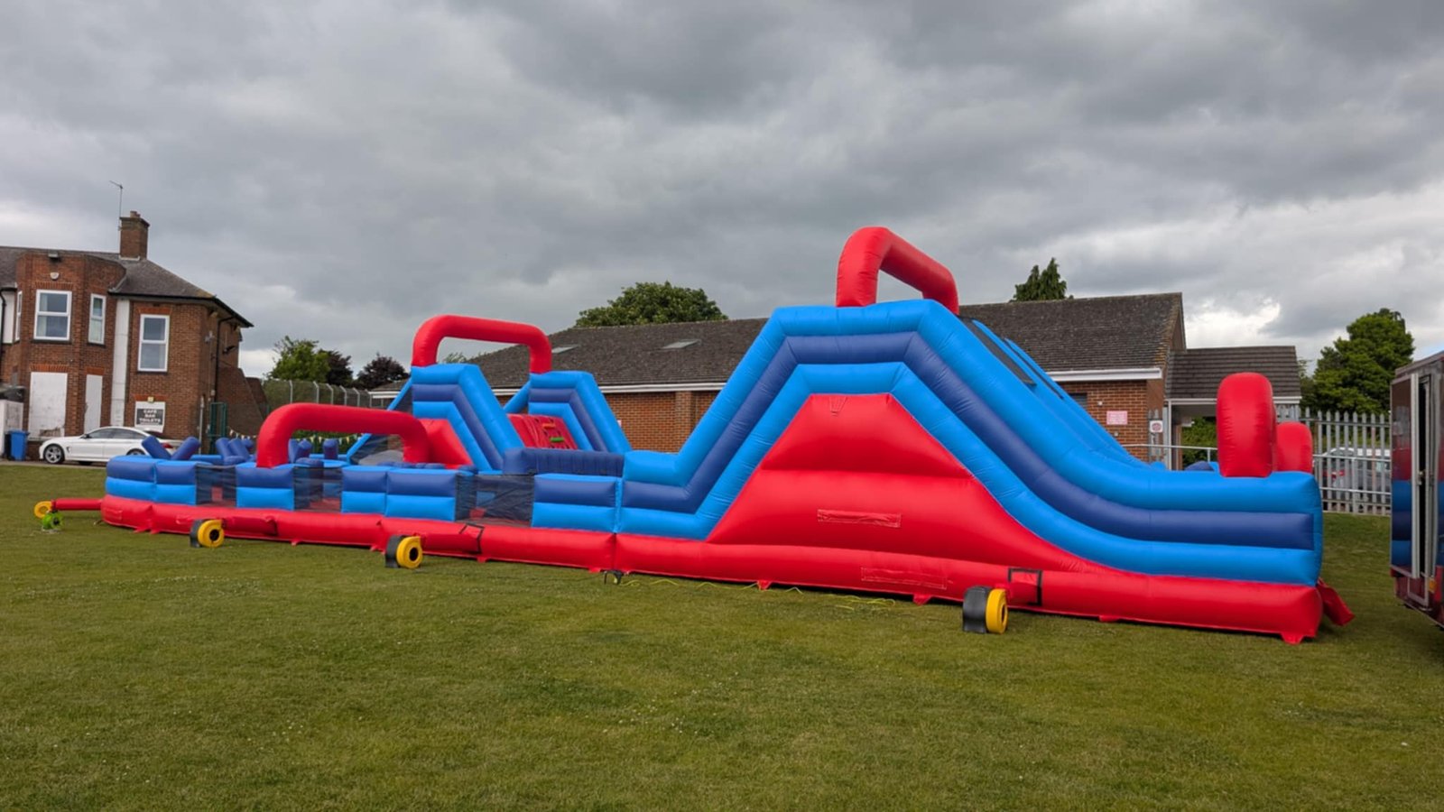 Participants enjoying obstacle course at event