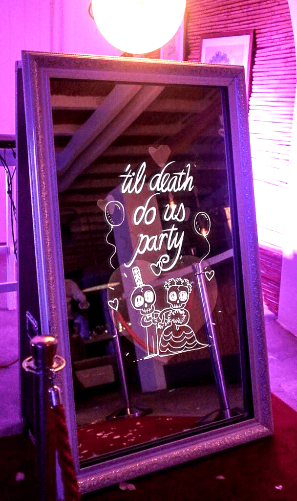 Magic mirror photo booth Lincolnshire with custom neon signage for parties and weddings