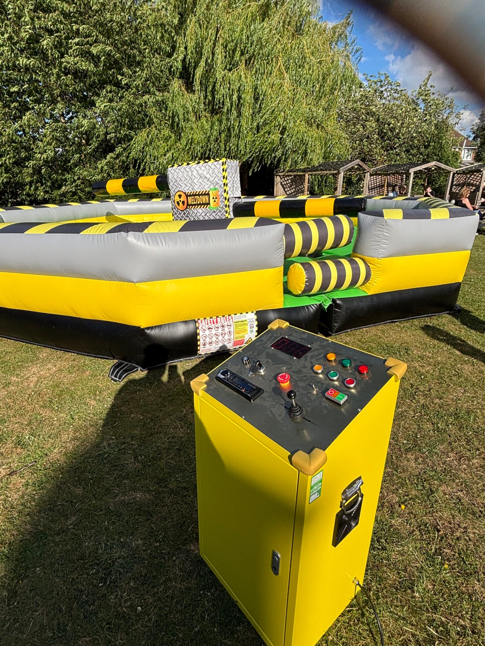 Total Wipeout inflatable arena with professional control panel setup in Goole