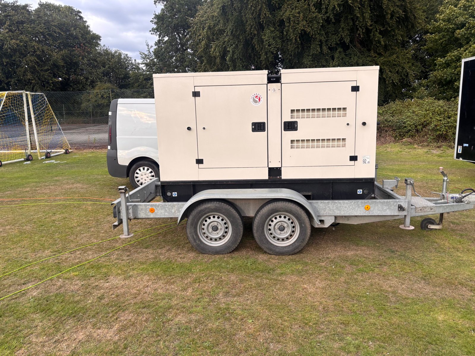 60kVA silent diesel generator deployed at an outdoor event in East Yorkshire